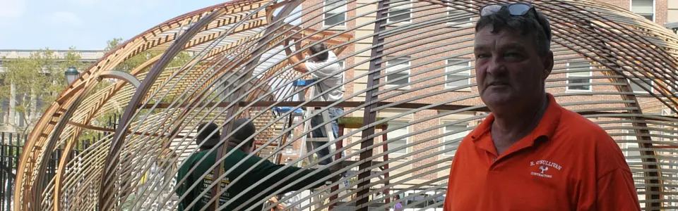 Robert O'Sullivan beside the Knotted Grotto while work continued on the installation