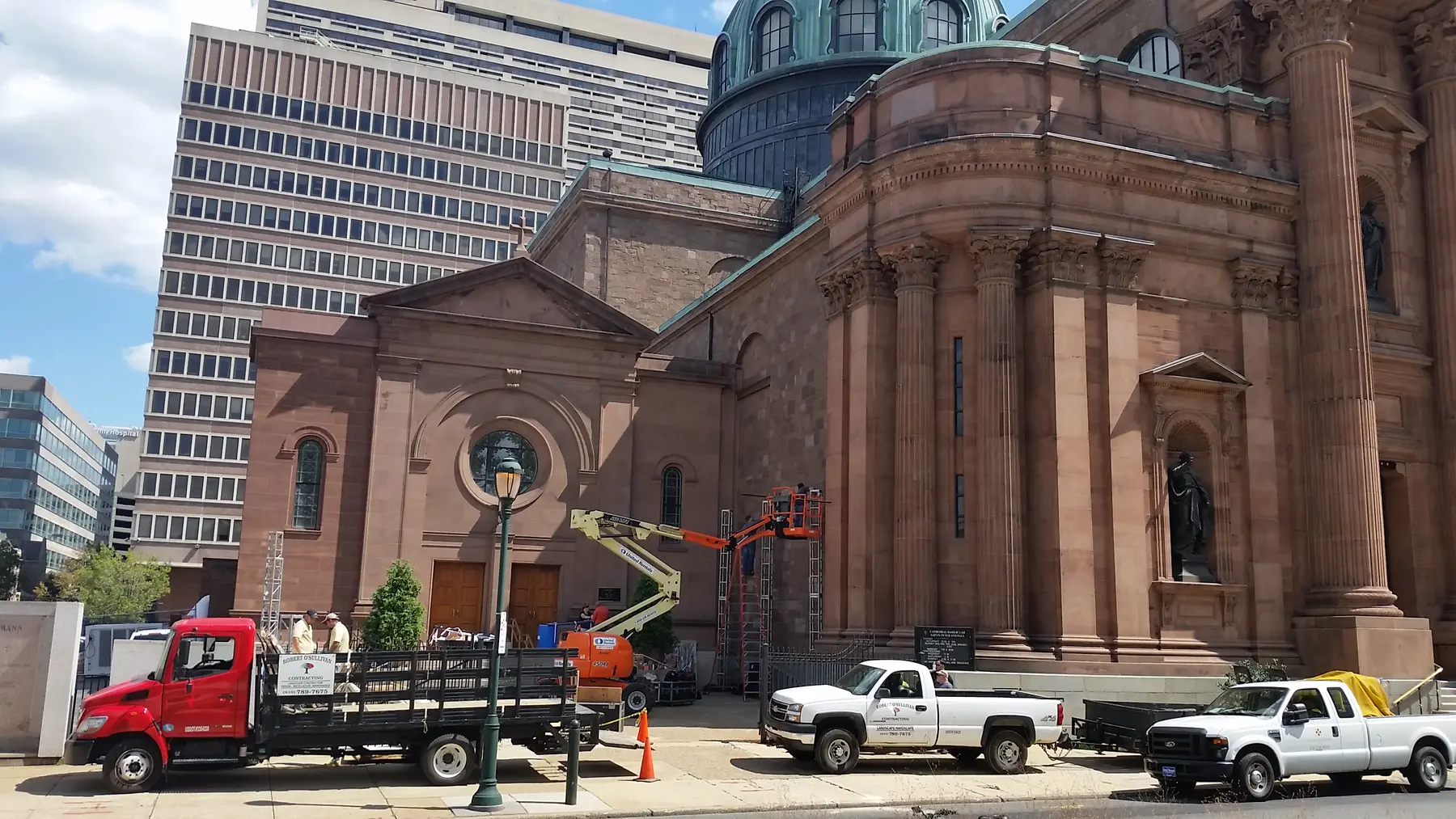 Robert O'Sullivan's crew helping build the Knotted Grotto installation beside the Cathedral Basilica in Philadelphia